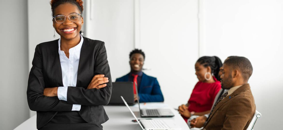 Businesswoman leading accredited corporate training session for B-BBEE skills development compliance in South Africa